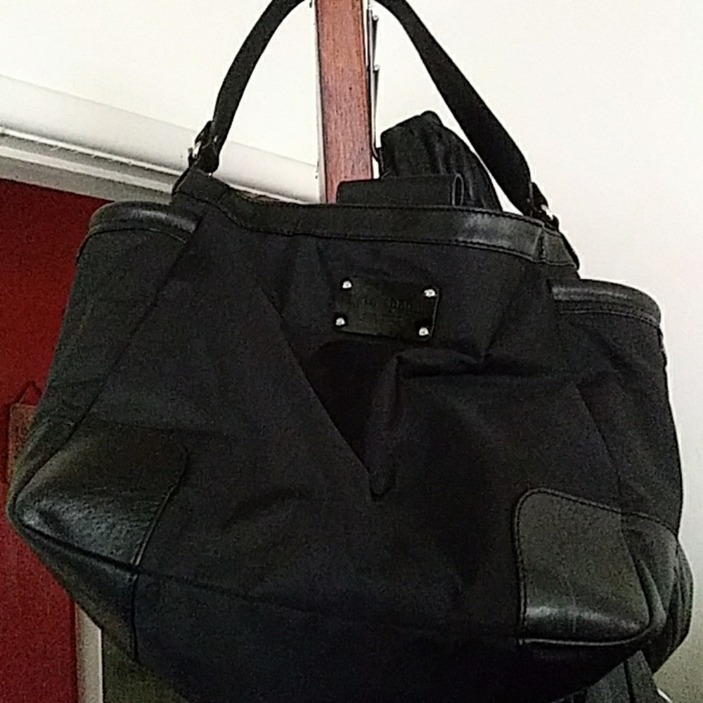 Auth Kate Spade purse. Light wear to corners.